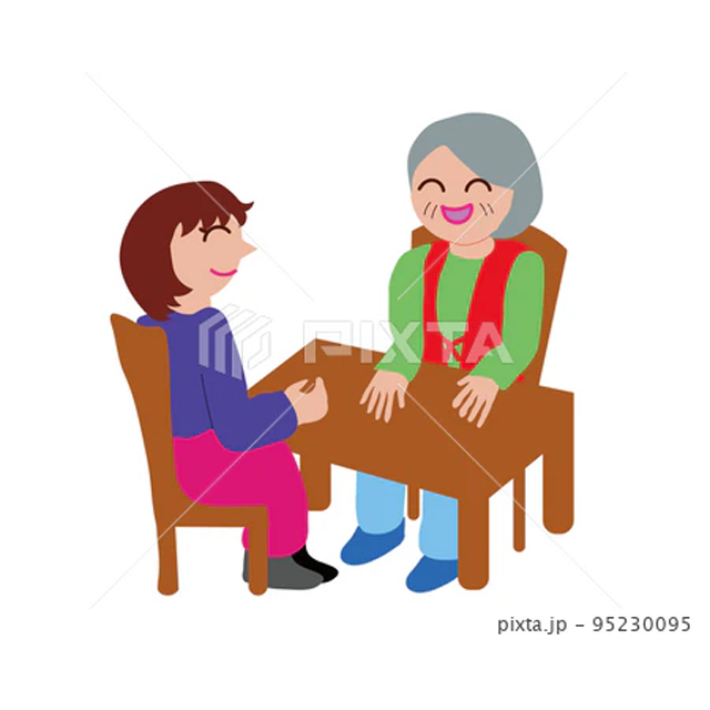 介護施設で高齢者と面会をしている女性