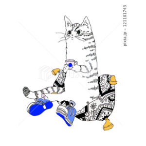 靴を履いてリラックスしている黒トラ猫